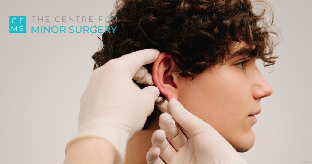 Patient getting ear examined (models) The Centre for Minor Surgery logo.